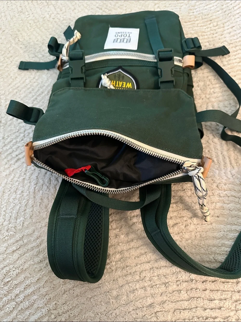Topo Designs Mini River Green Canvas Backpack with White Zip Pocket